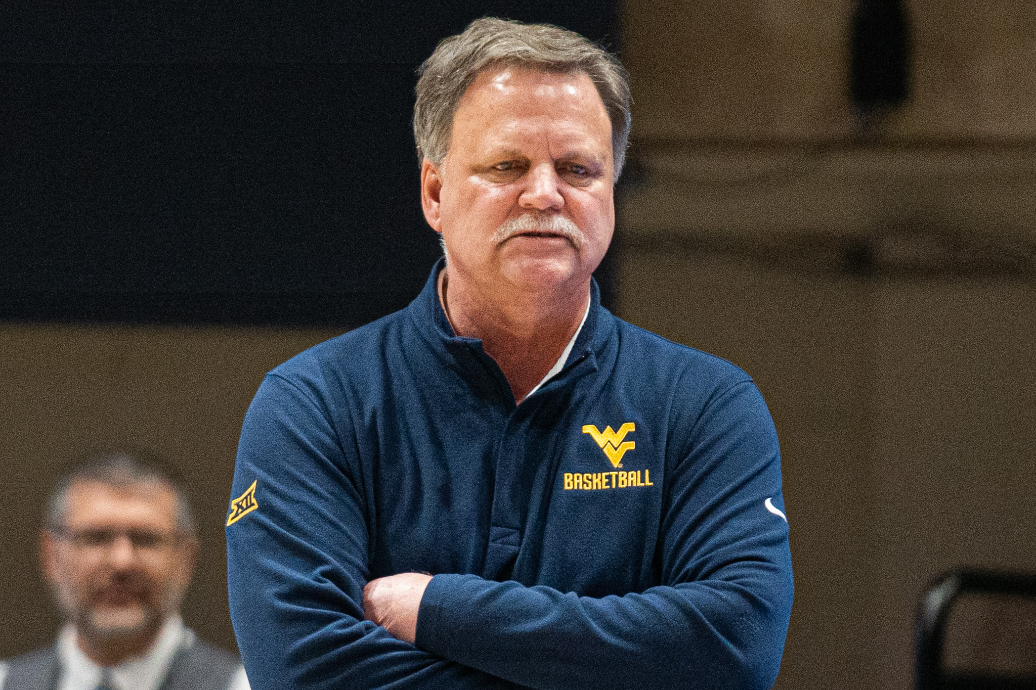 WVU women's basketball coach Mike Carey retires